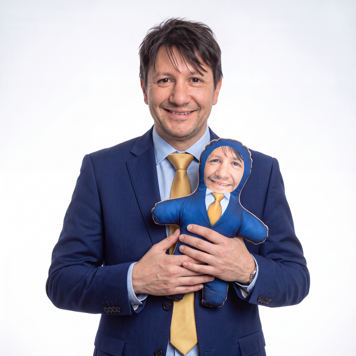 Blue Suit Gold Tie - small 26cm Mini Me held by its owner
