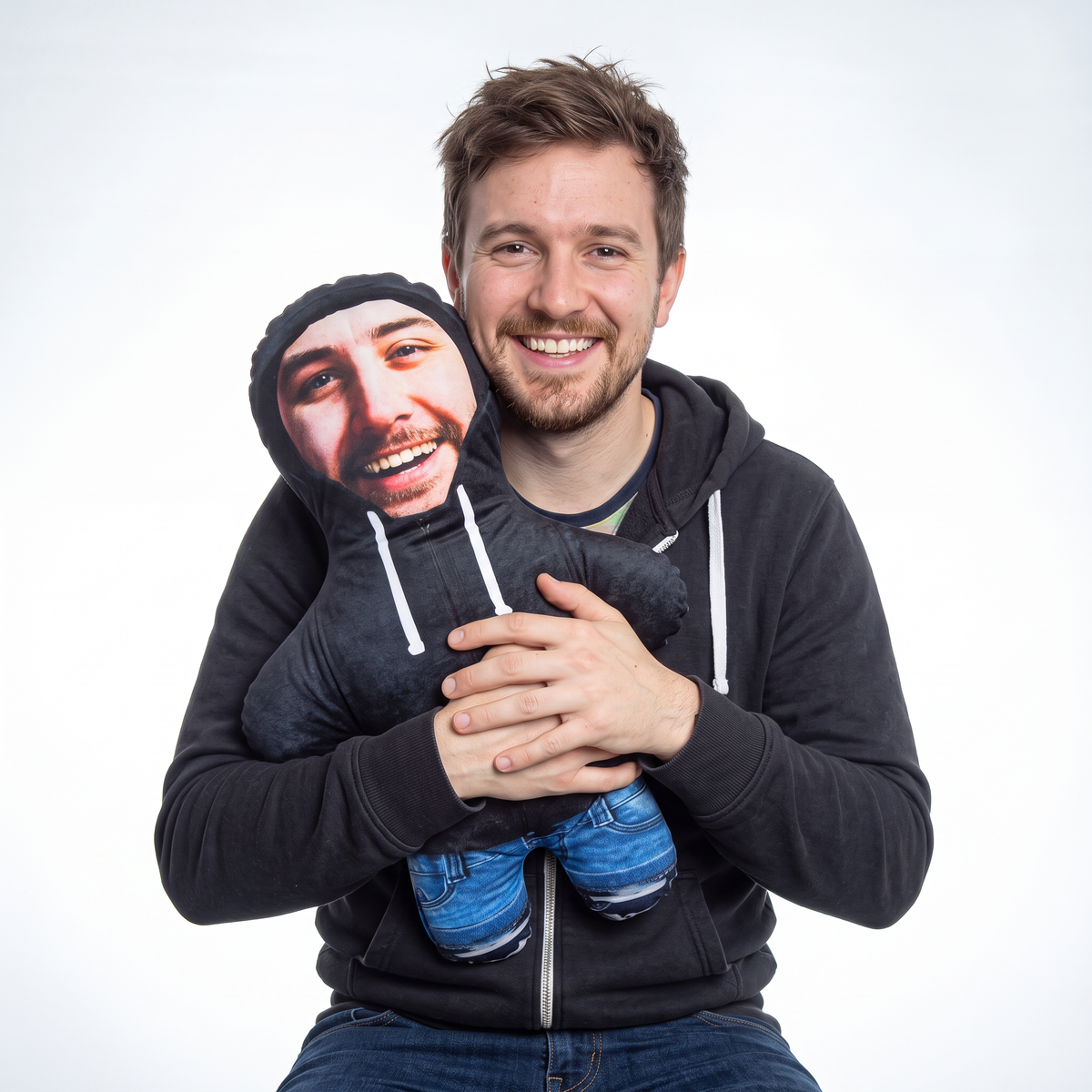 Black Hoodie - medium 46cm Mini Me held by its owner