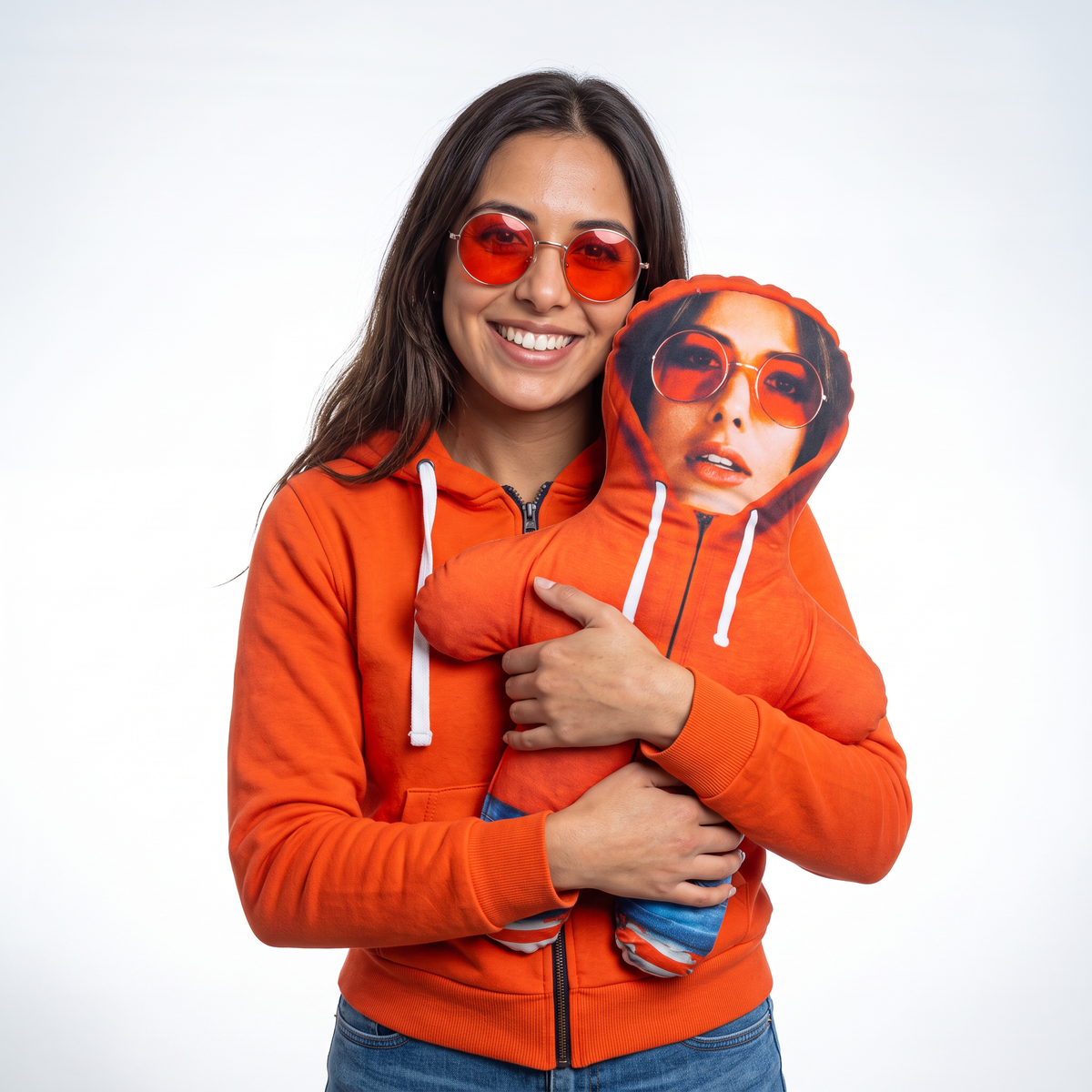 Orange Hoodie - medium 46cm Mini Me held by its owner