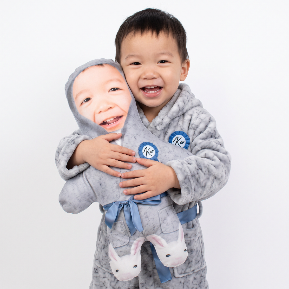 Fluffy Grey Dressing Gown - medium 46cm Mini Me held by its owner