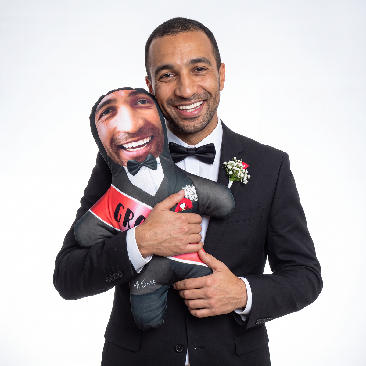 Groom - medium 46cm Mini Me held by its owner
