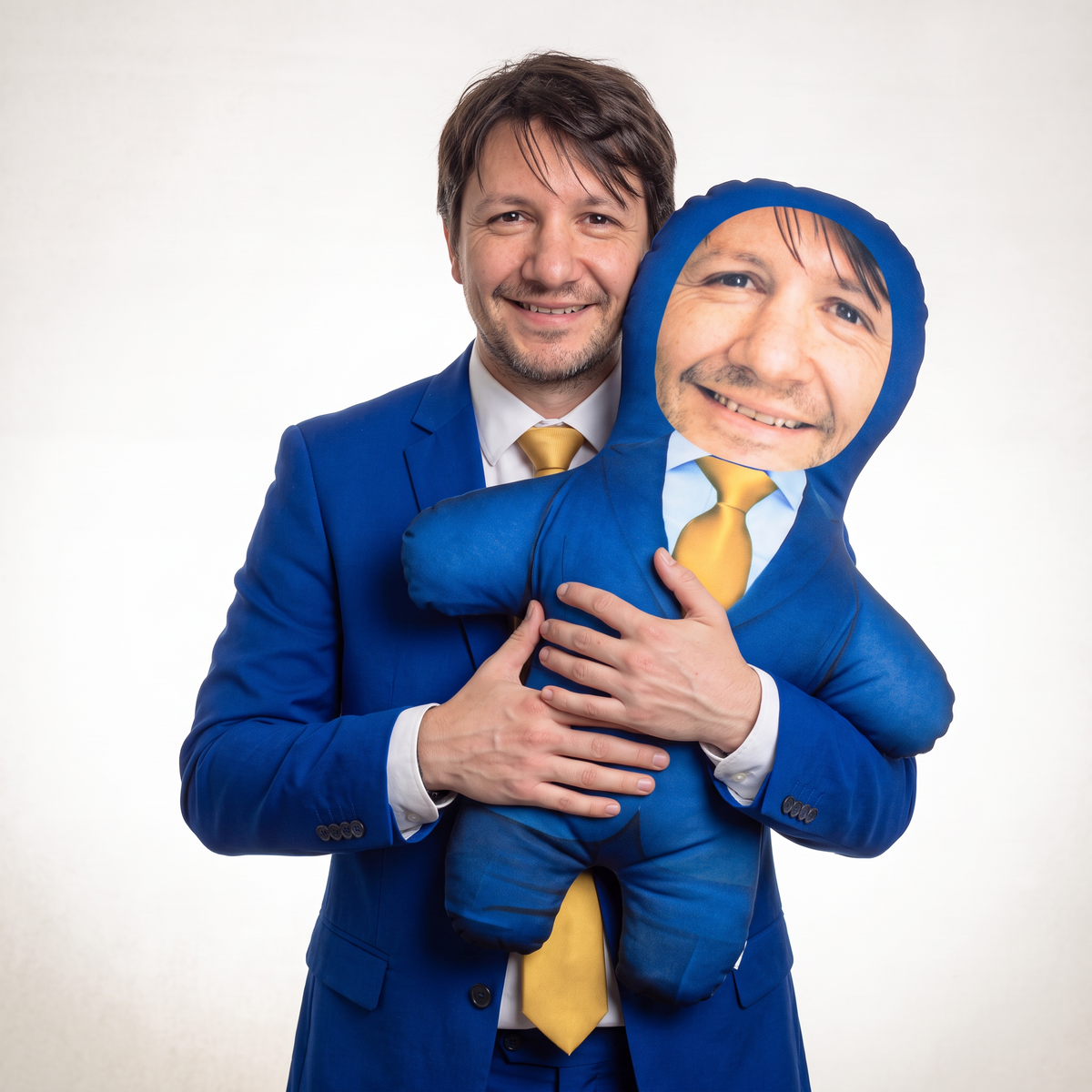 Blue Suit Gold Tie - large 80cm Mini Me held by its owner