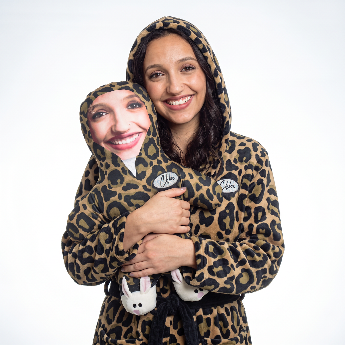 Fluffy Leopard Dressing Gown - medium 46cm Mini Me held by its owner