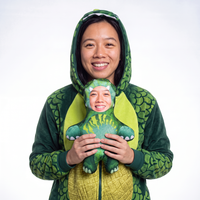 Dinosaur - small 26cm Mini Me held by its owner