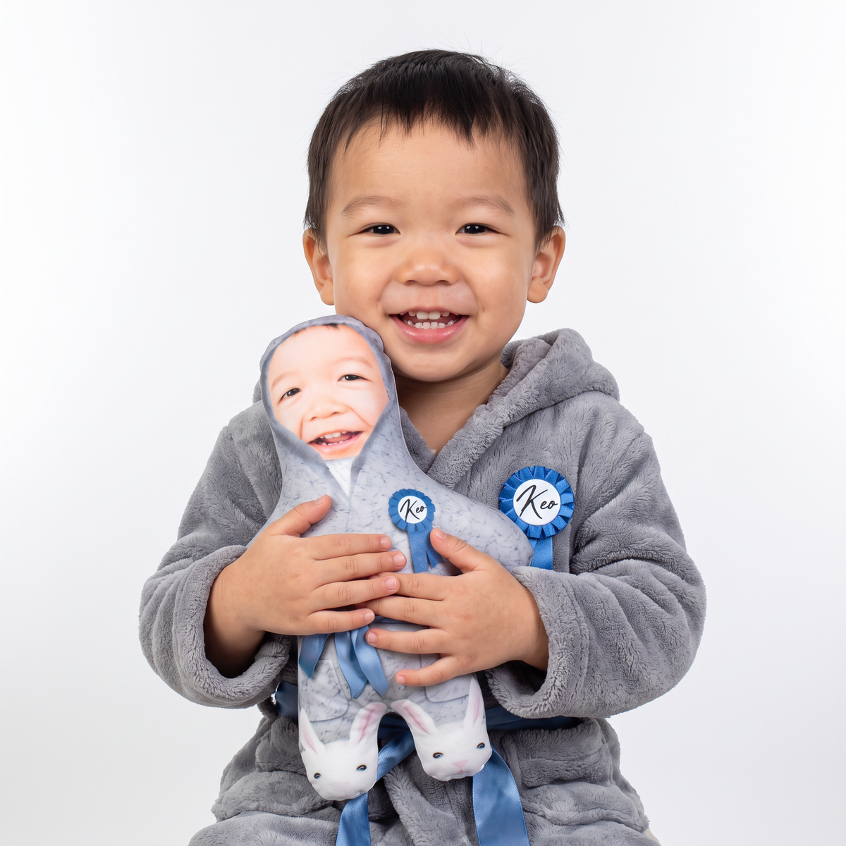 Fluffy Grey Dressing Gown - small 26cm Mini Me held by its owner